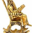 Golden Lord Ganesha Statue Sitting On A Rocking Chair And Reading Ramayan Showpiece