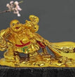 Feng Shui Lucky Laughing Buddha Pulling Big Potli Showpiece